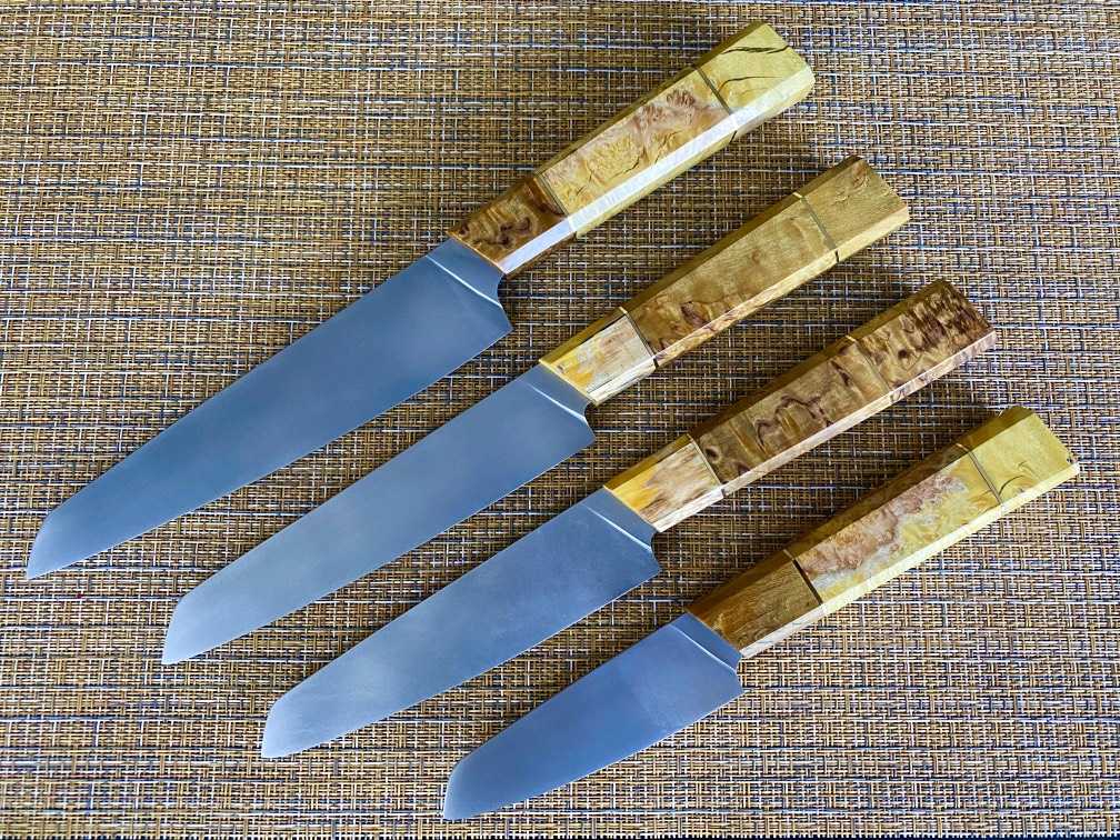Набор кухонных ножей (4 ножа) из стали S 390, рукоять стабилизированная .